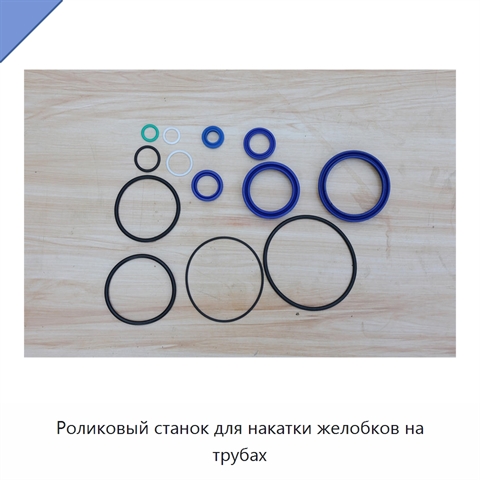 Роликовый станок для накатки желобков на трубах